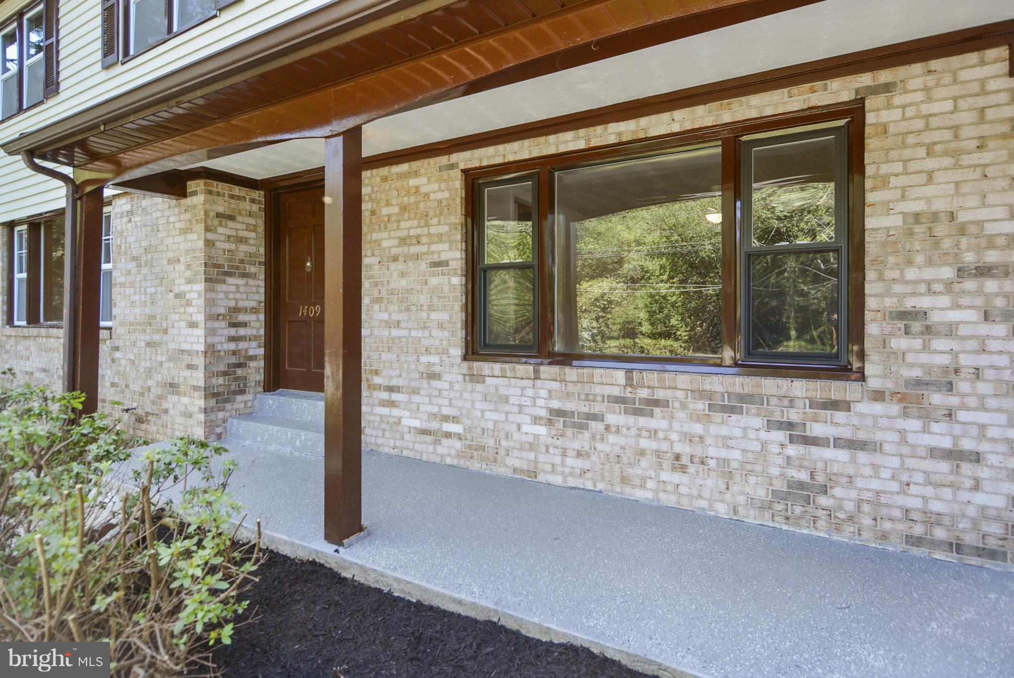 1409 Jackson Road Silver Spring, MD 20904 - Photo 3 of 30 a view of entrance door of the house