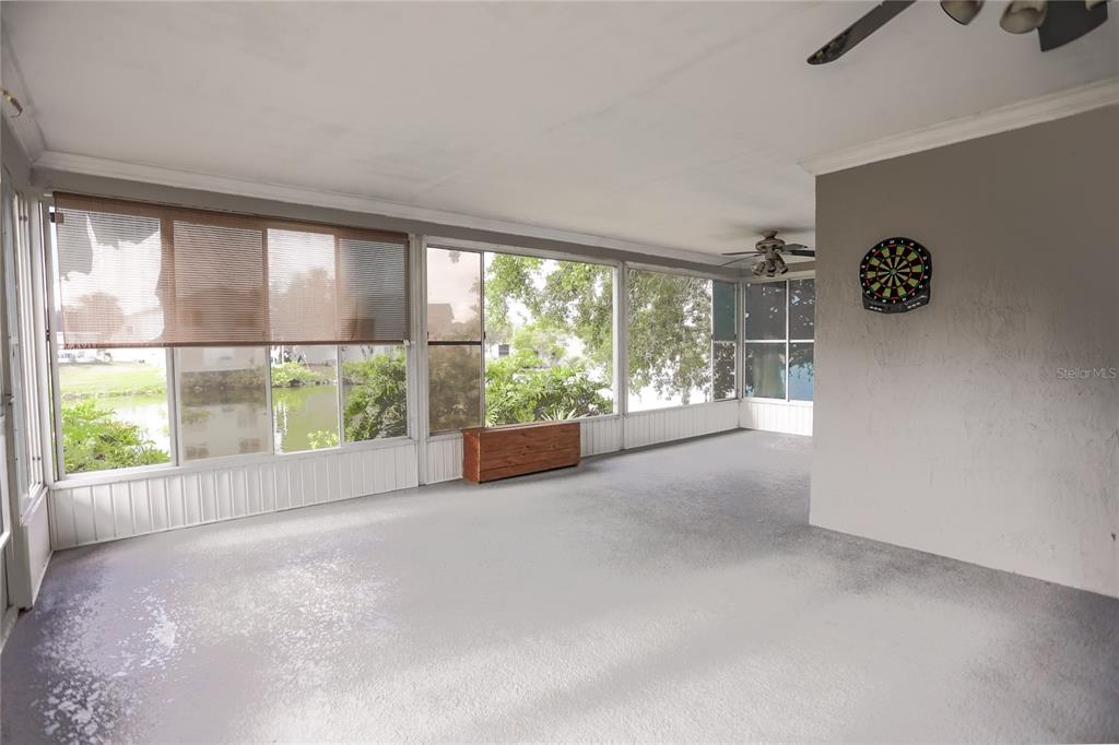 2083 Windward Pass Lakeland, FL 33813 - Photo 12 of 15 an empty room with large windows