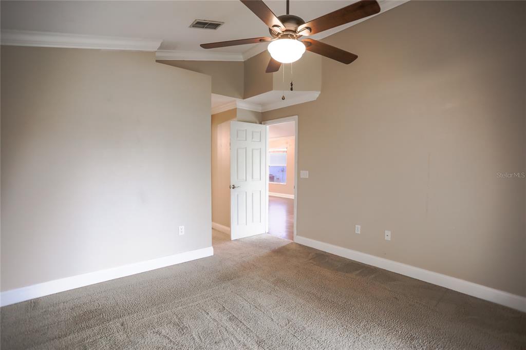 2083 Windward Pass Lakeland, FL 33813 - Photo 8 of 15 a view of an empty room with a window