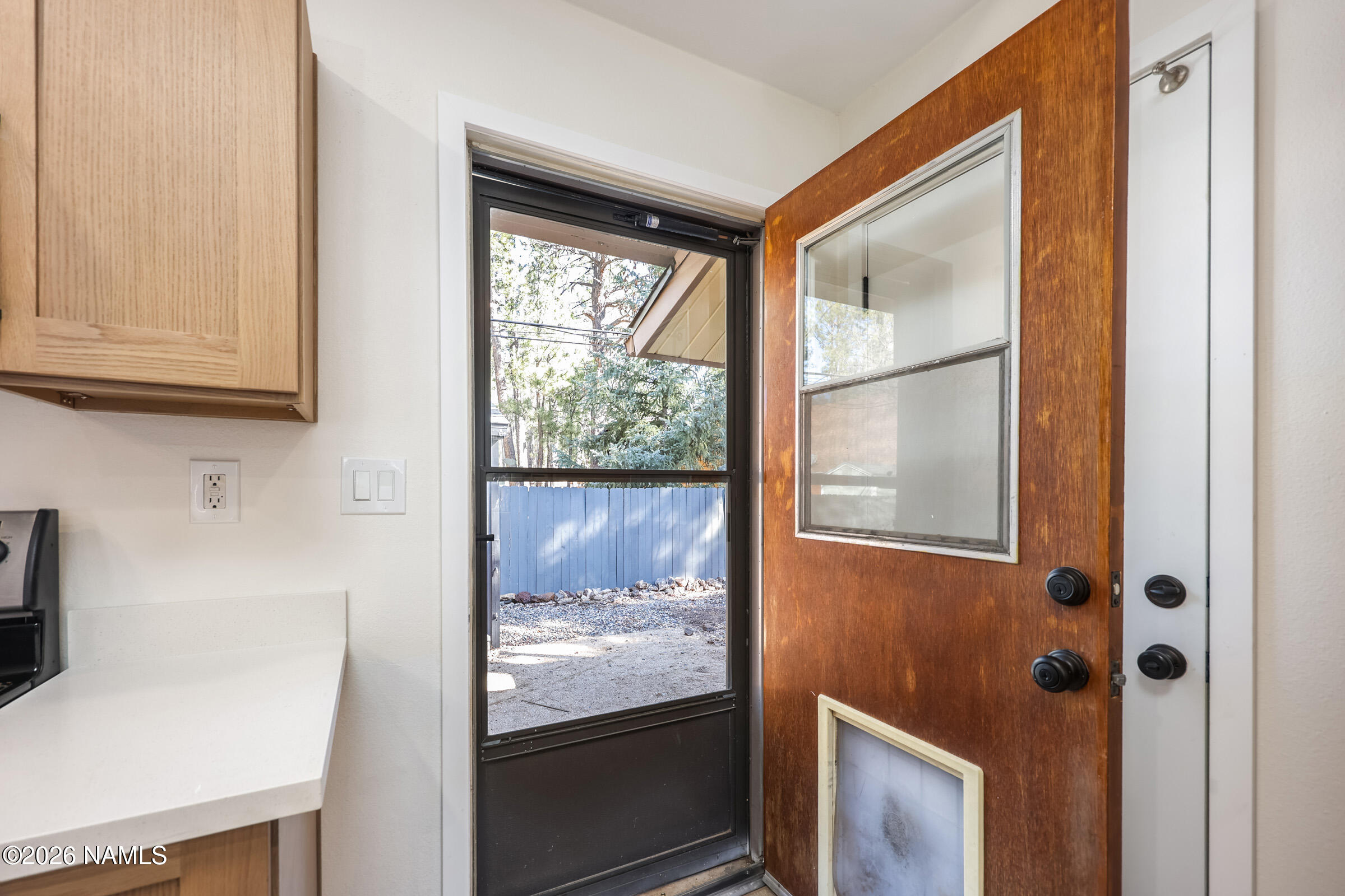 940 Caribou Road Munds Park, AZ 86017 - Photo 16 of 49 Door to Back Yard