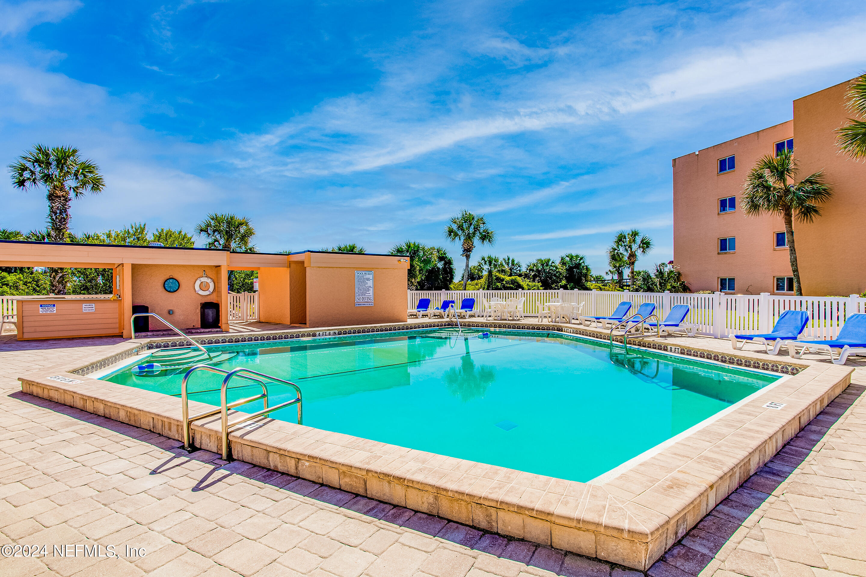 4 Ocean Trace Road, Unit 102 St. Augustine, FL 32080 - Photo 25 of 37 swimming pool view with seating space