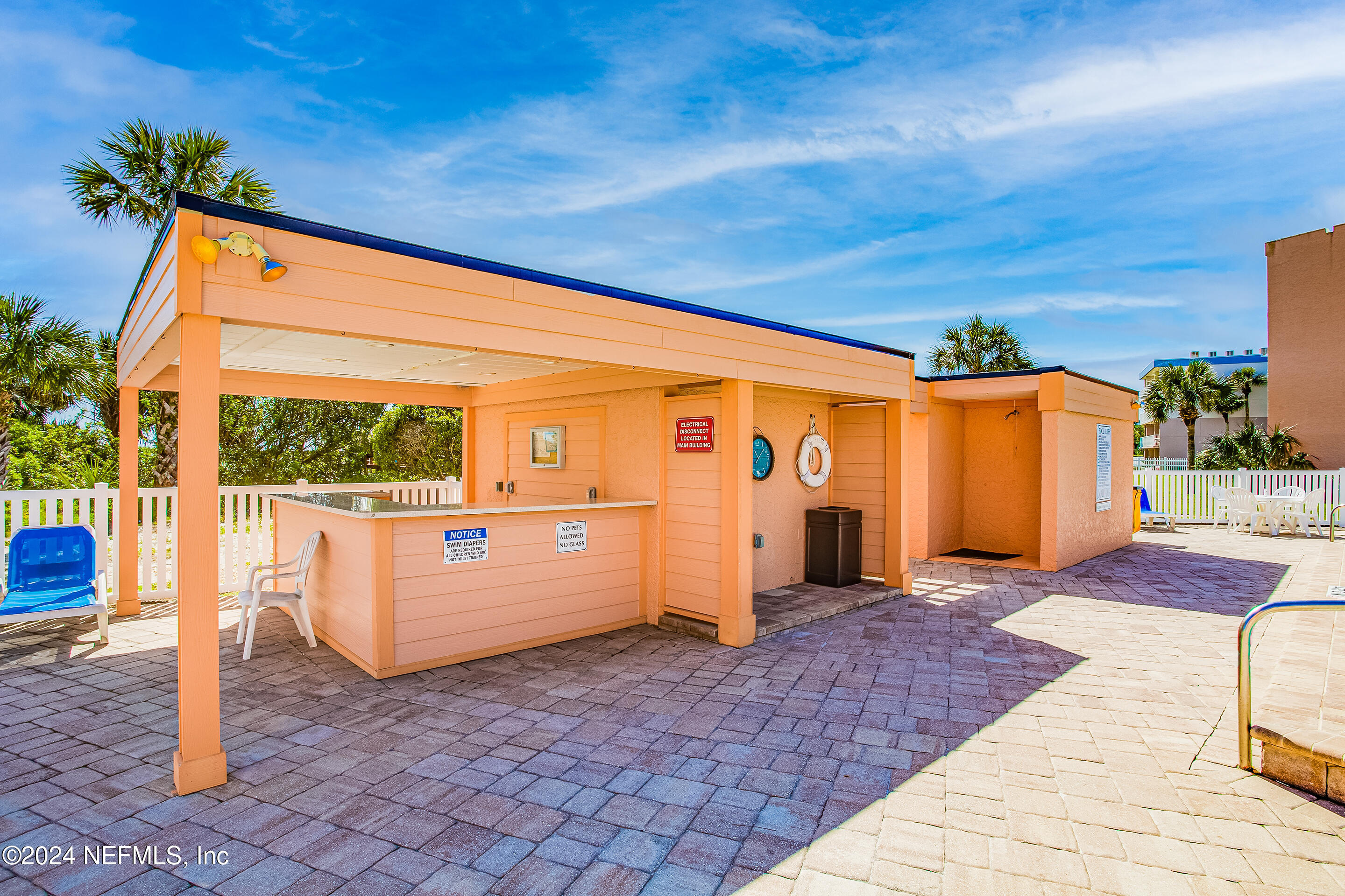 4 Ocean Trace Road, Unit 102 St. Augustine, FL 32080 - Photo 26 of 37 a front view of a house with a large window