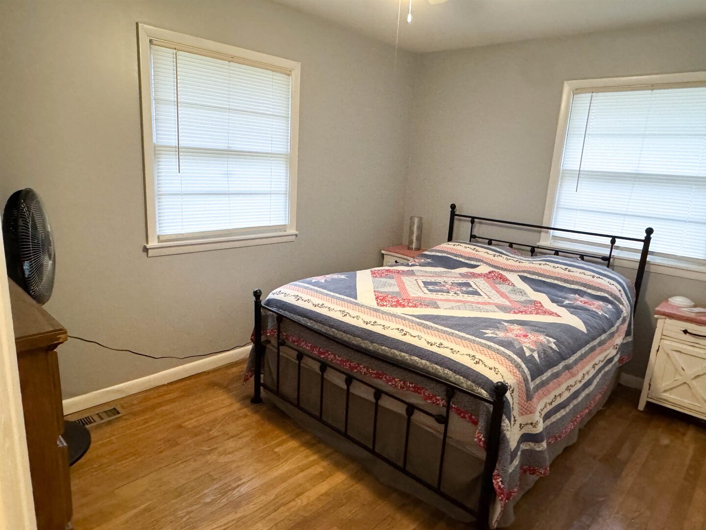 300 Williford Road Jonesboro, IL 62952 - Photo 23 of 29 a bed sitting in a bedroom next to a window