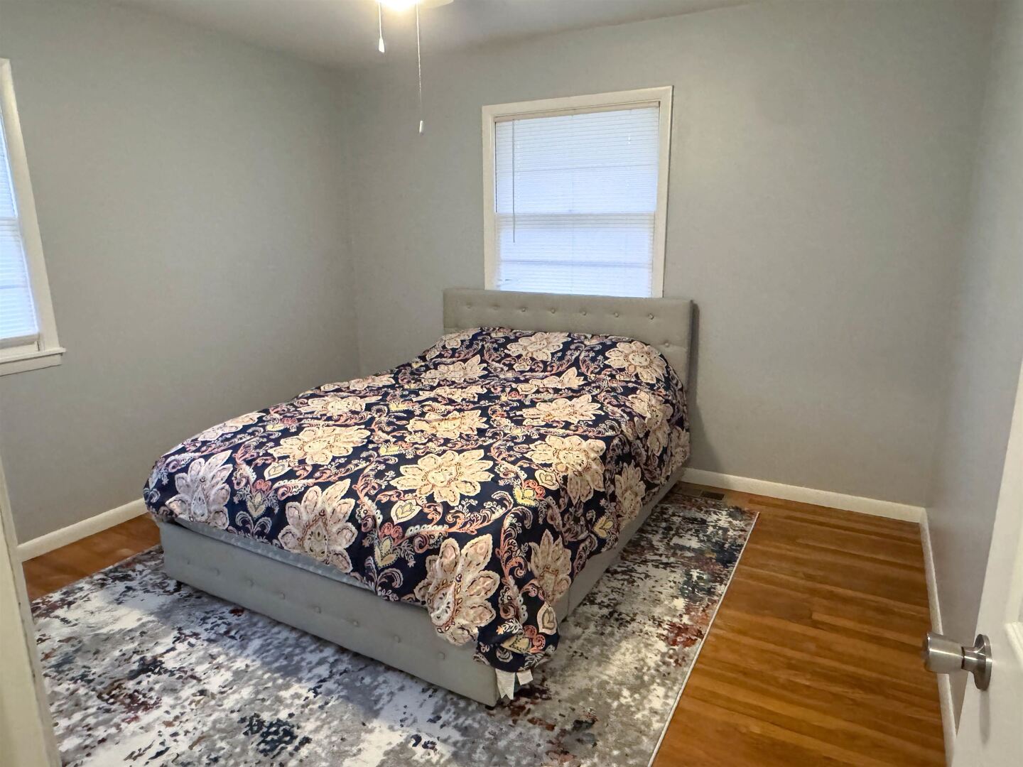 300 Williford Road Jonesboro, IL 62952 - Photo 24 of 29 a bed sitting in a bedroom next to a window