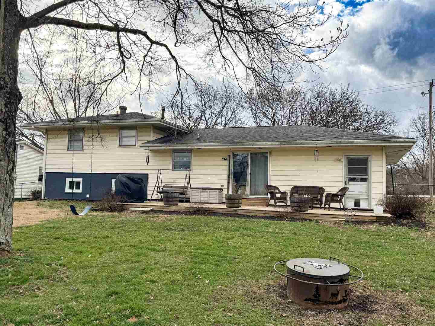 300 Williford Road Jonesboro, IL 62952 - Photo 7 of 29 a view of a house with backyard porch and sitting area