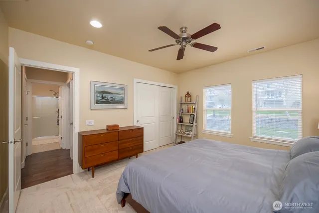 a bedroom with a bed and window