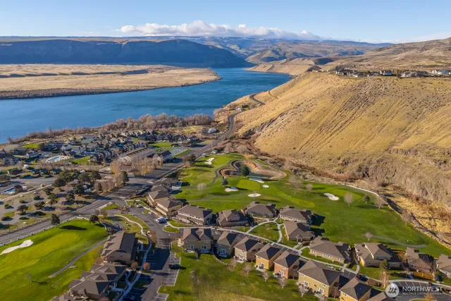 a view of an ocean and a mountain
