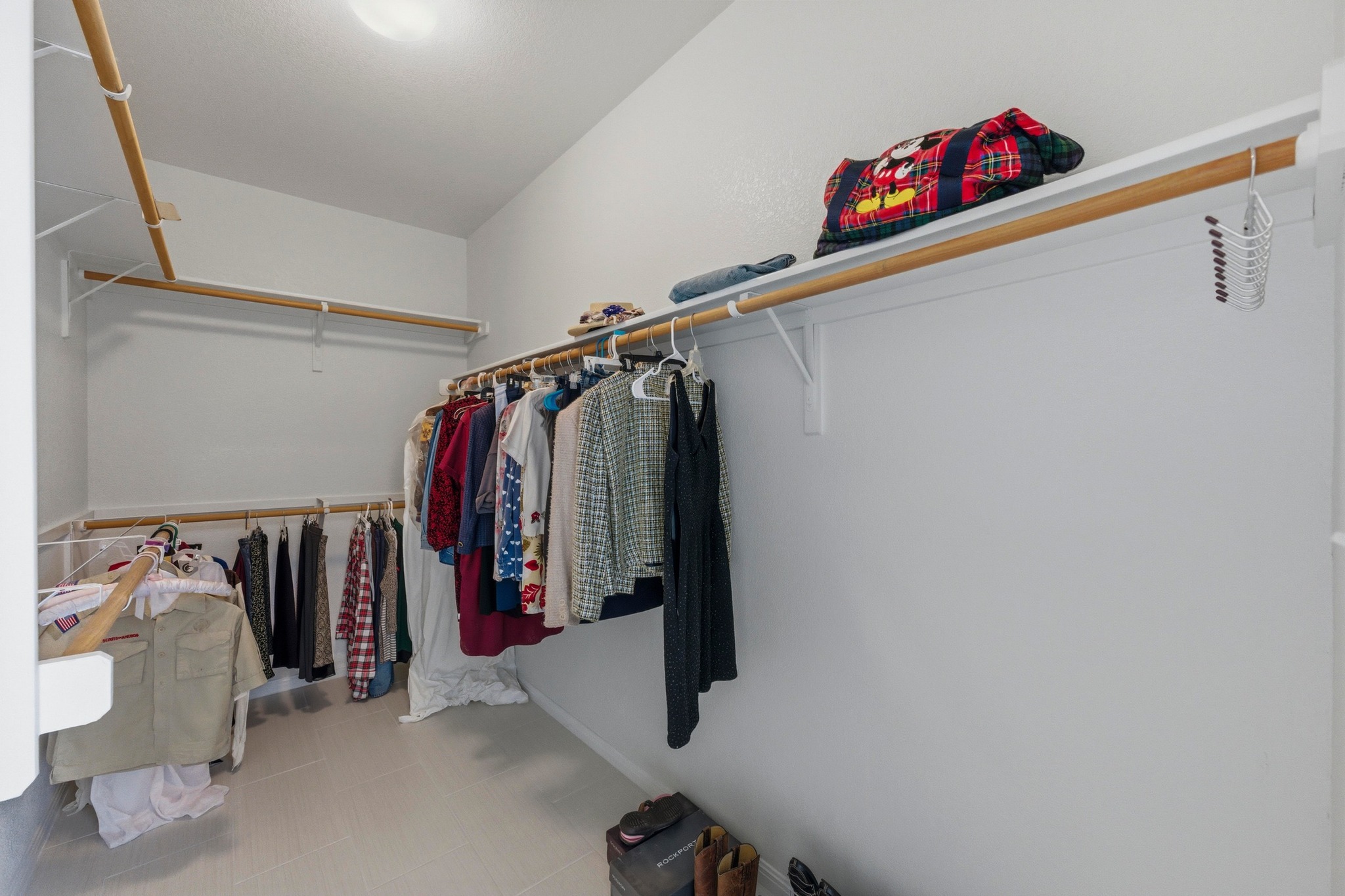 7805 Pitter Pat Lane Austin, TX 78736 - Photo 23 of 40 a view of walk in closet with clothes and shoes