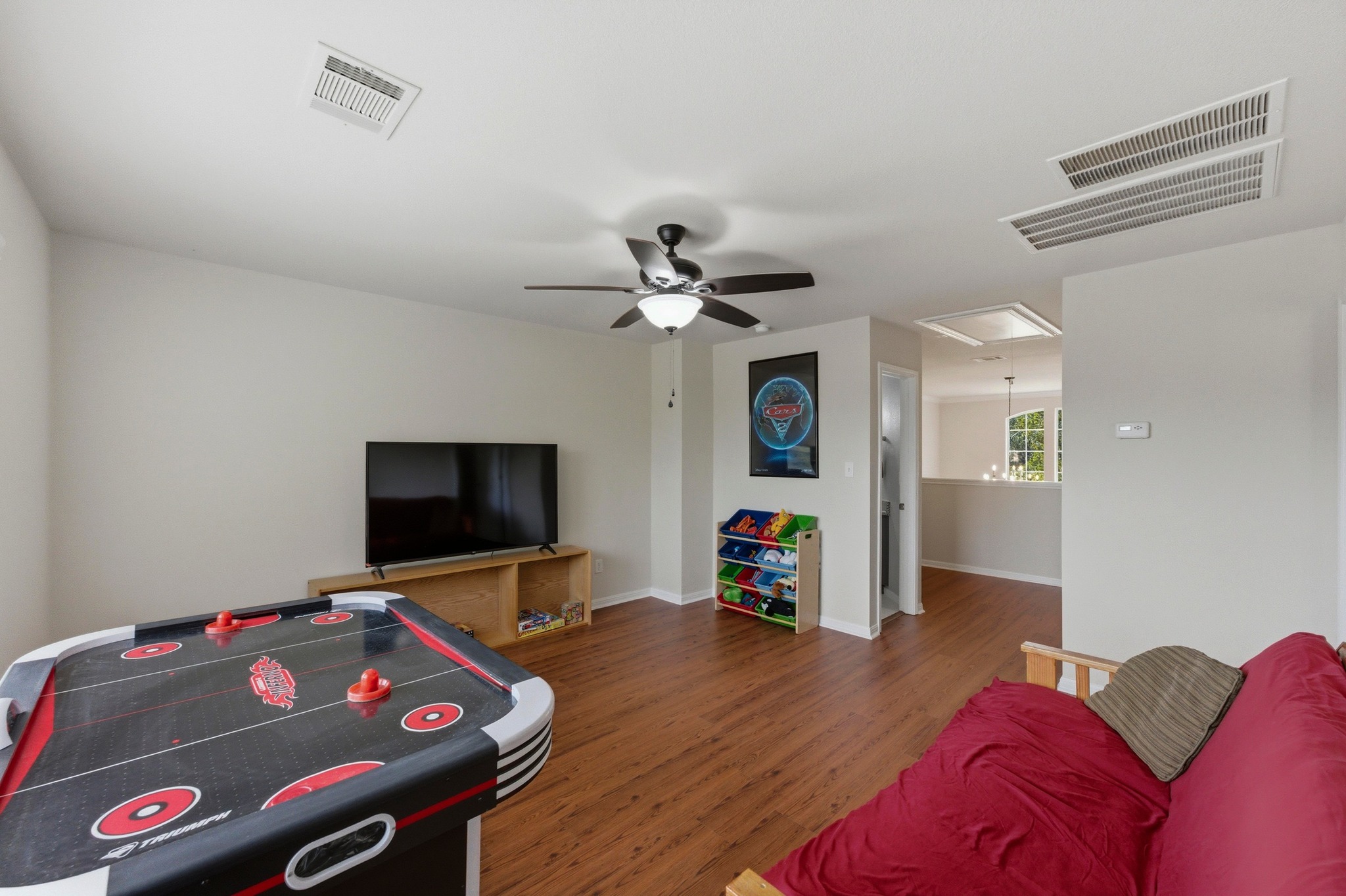 7805 Pitter Pat Lane Austin, TX 78736 - Photo 25 of 40 a living room with furniture and a flat screen tv