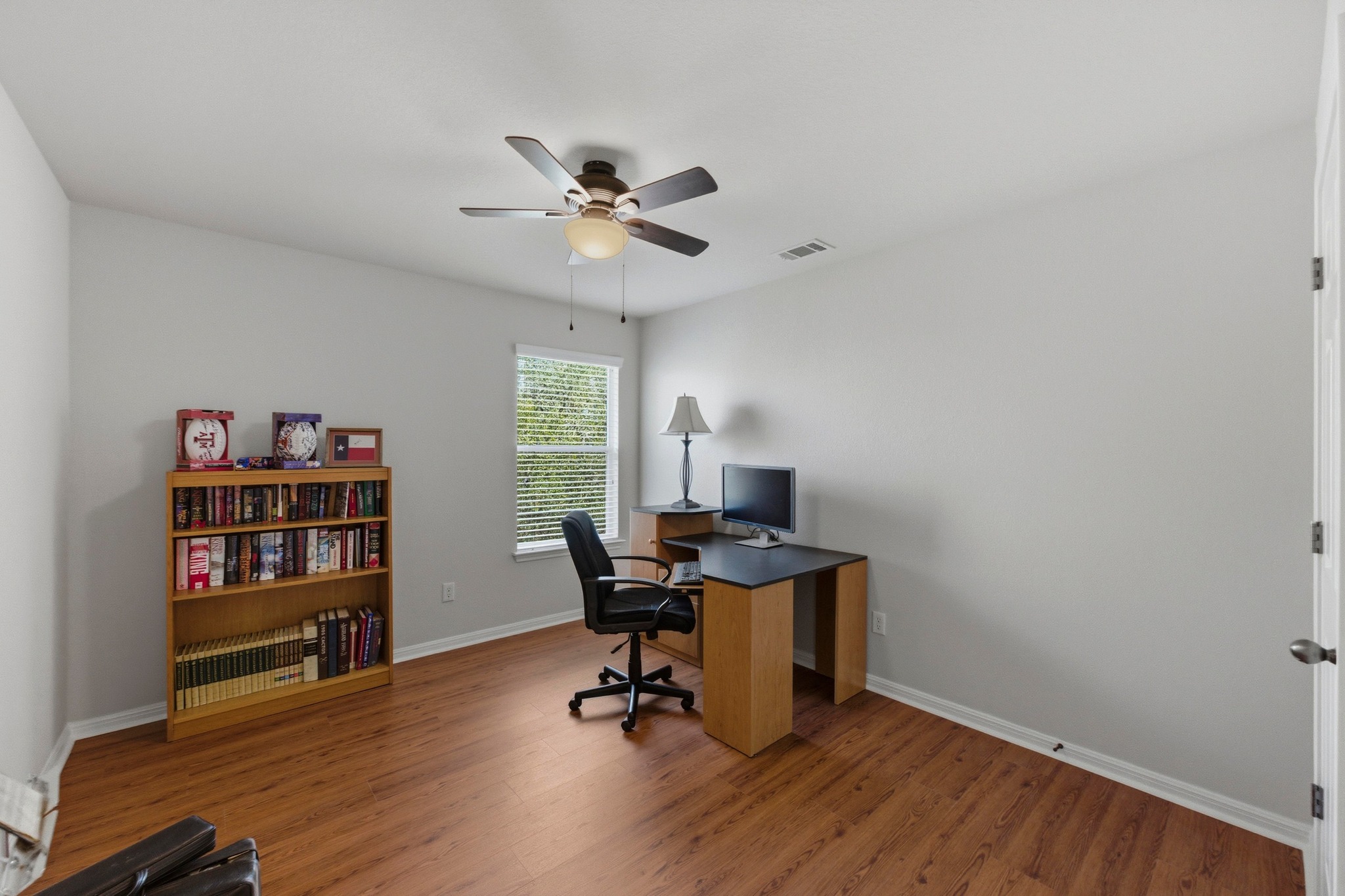 7805 Pitter Pat Lane Austin, TX 78736 - Photo 29 of 40 a view of a workspace with furniture and a window