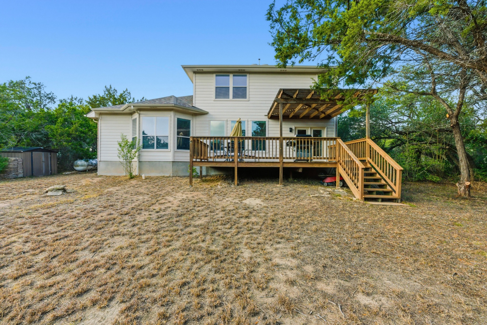 7805 Pitter Pat Lane Austin, TX 78736 - Photo 32 of 40 front view of a house with a yard