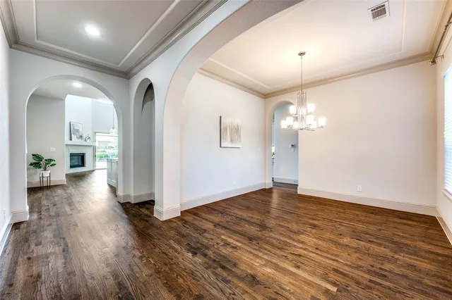 a view of a livingroom with wooden floor