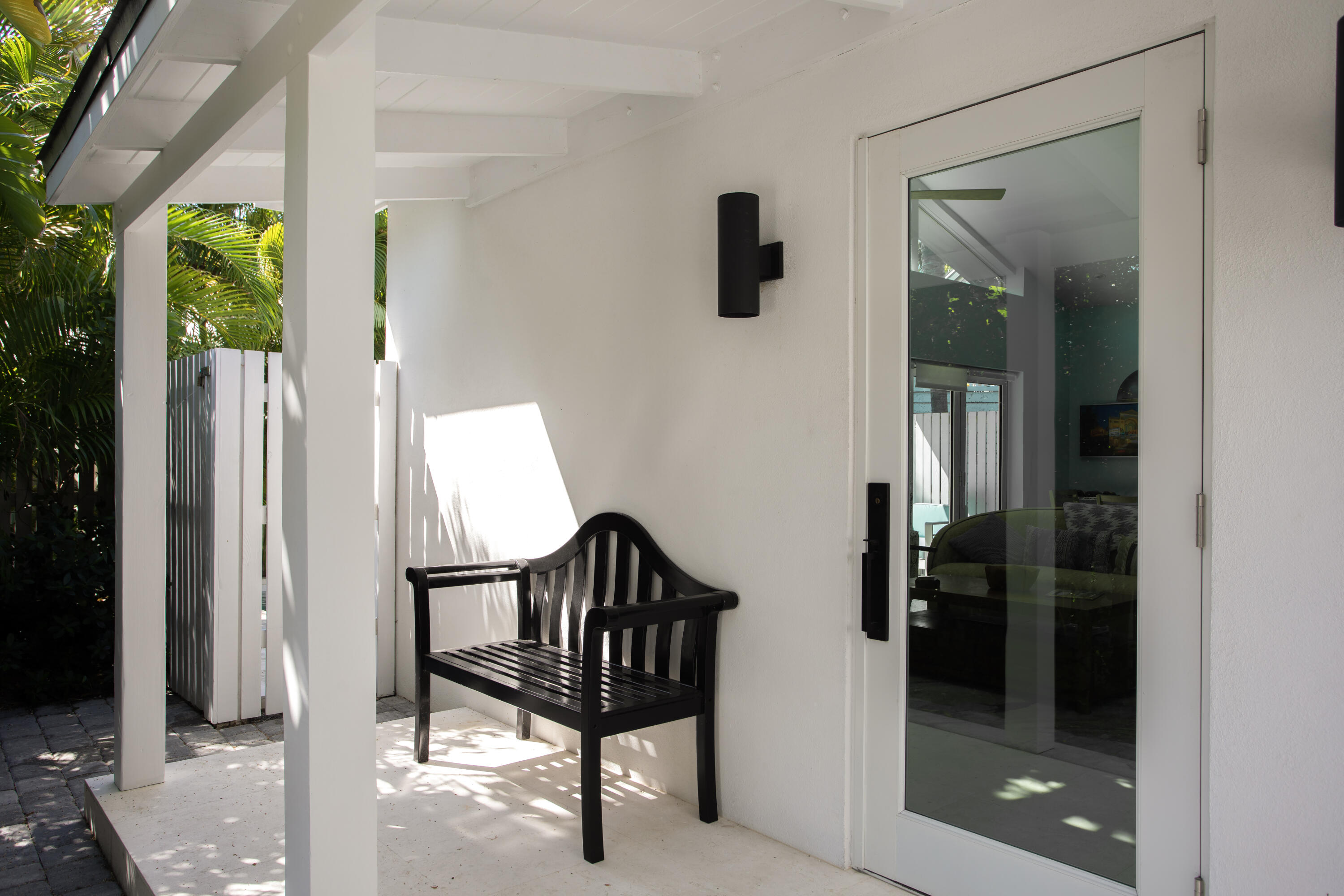 1215 Duncan Street Key West, FL 33040 - Photo 2 of 14 a view of entryway and hall with wooden floor