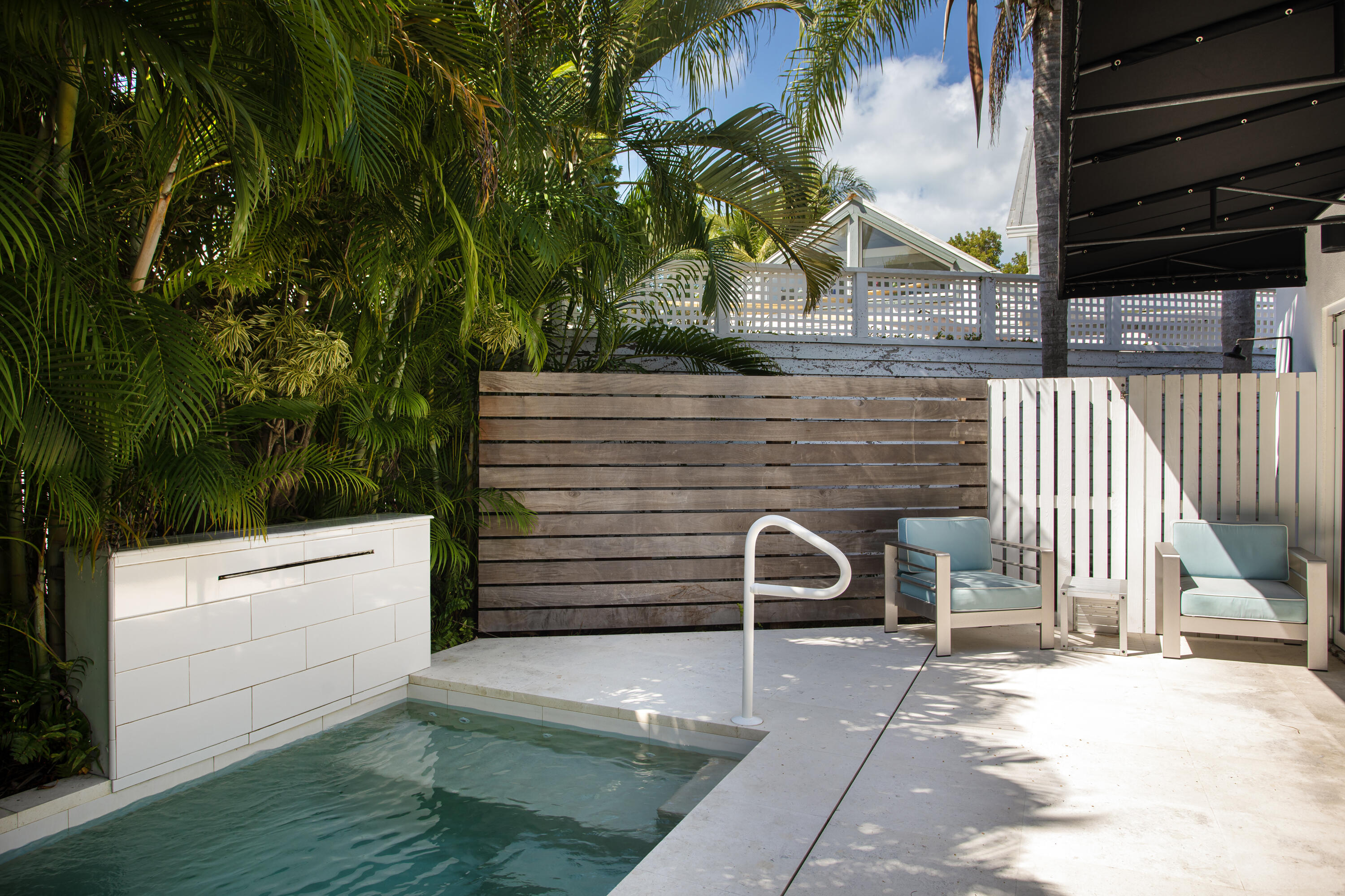 1215 Duncan Street Key West, FL 33040 - Photo 7 of 14 a front view of a house with a yard