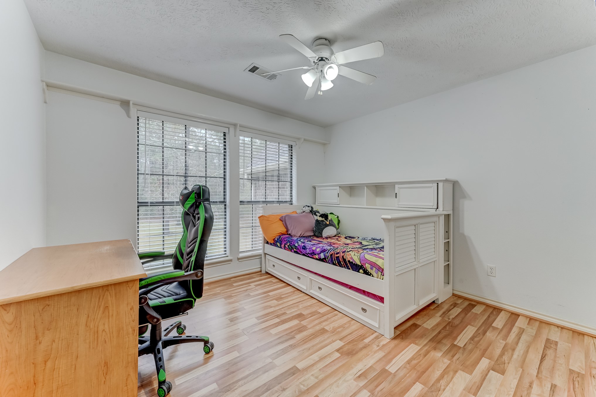 1210 Cherry Creek Road Dayton, TX 77535 - Photo 35 of 50 a living room with furniture a chandelier and a potted plant
