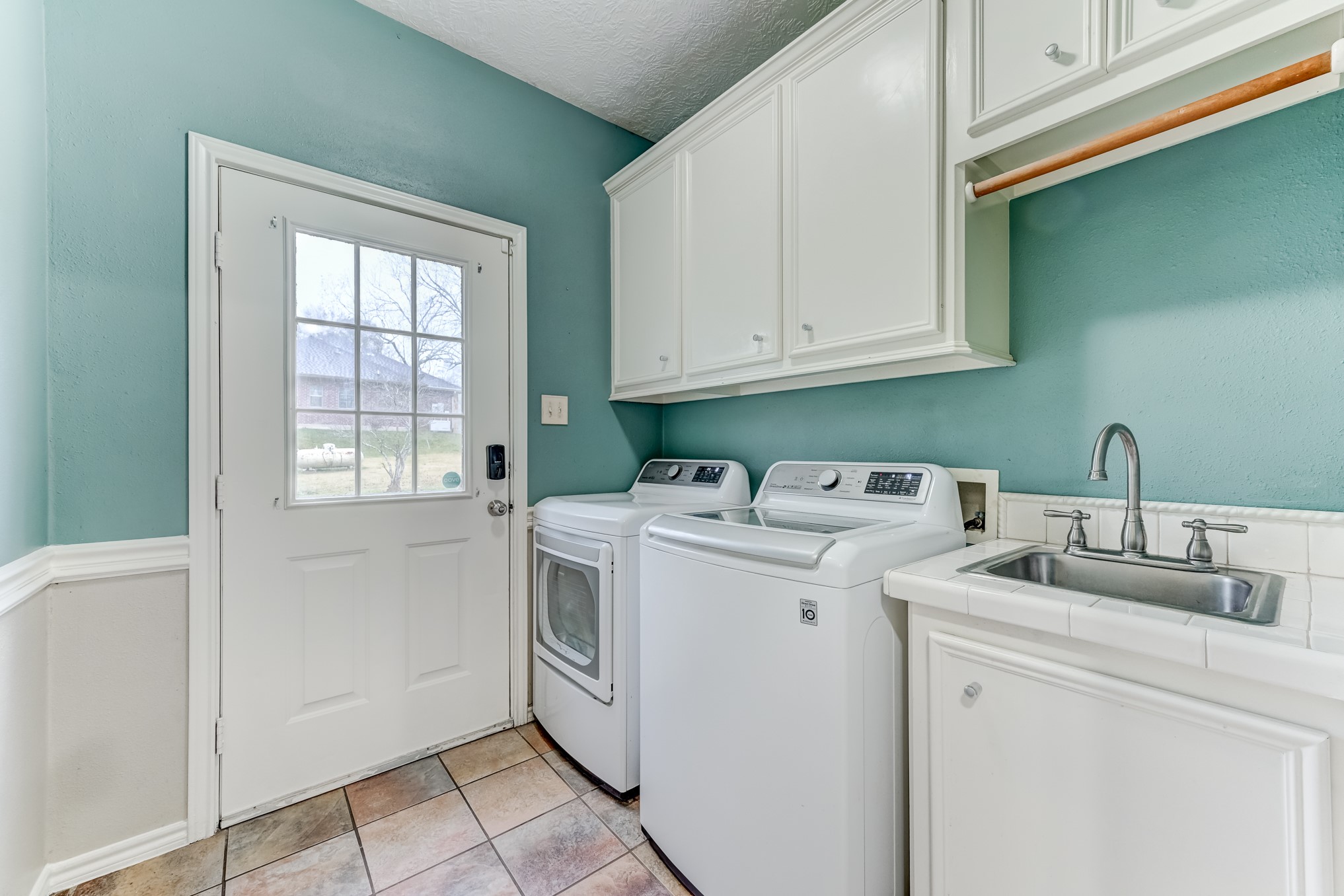 1210 Cherry Creek Road Dayton, TX 77535 - Photo 37 of 50 a utility room with dryer and washer