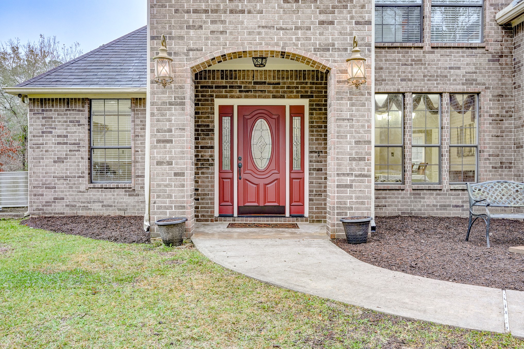 1210 Cherry Creek Road Dayton, TX 77535 - Photo 4 of 50 a front view of a house with garden