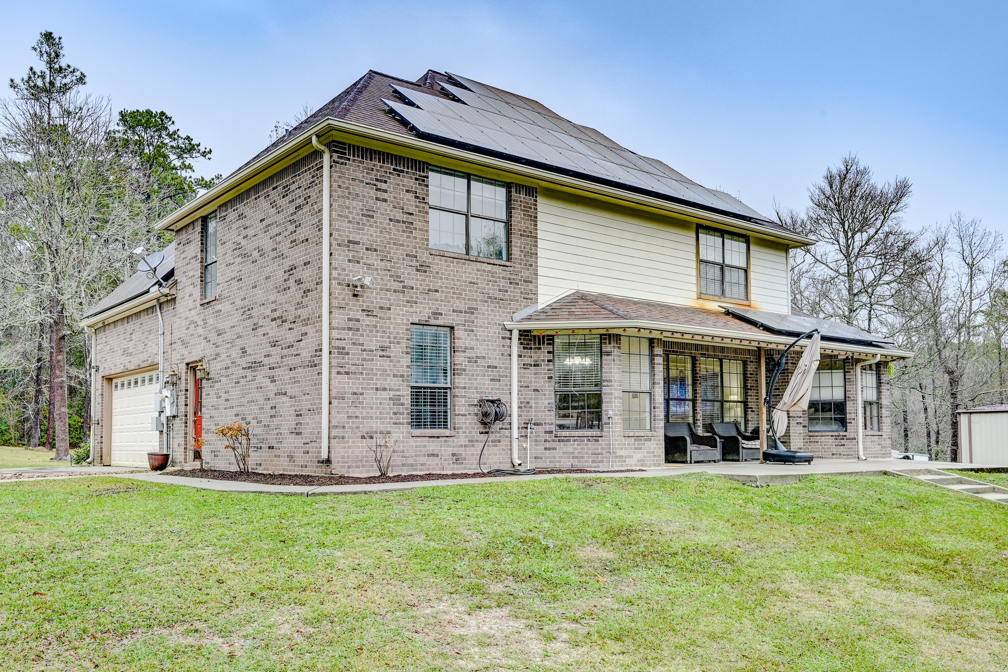 1210 Cherry Creek Road Dayton, TX 77535 - Photo 44 of 50 a front view of a house with garden