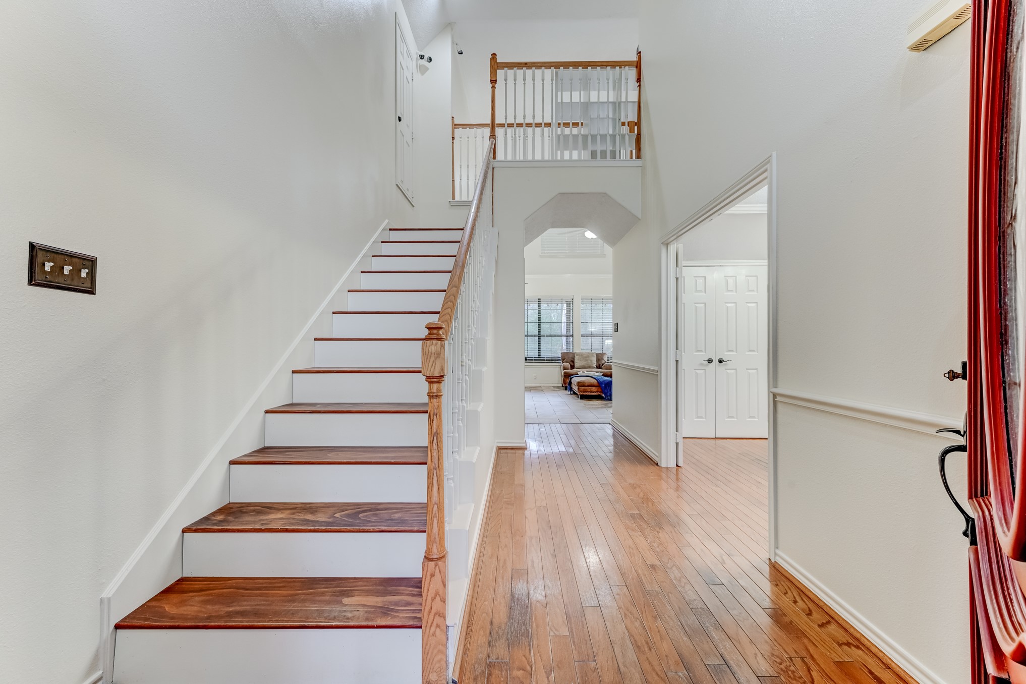 1210 Cherry Creek Road Dayton, TX 77535 - Photo 5 of 50 a view of entryway and hall with wooden floor