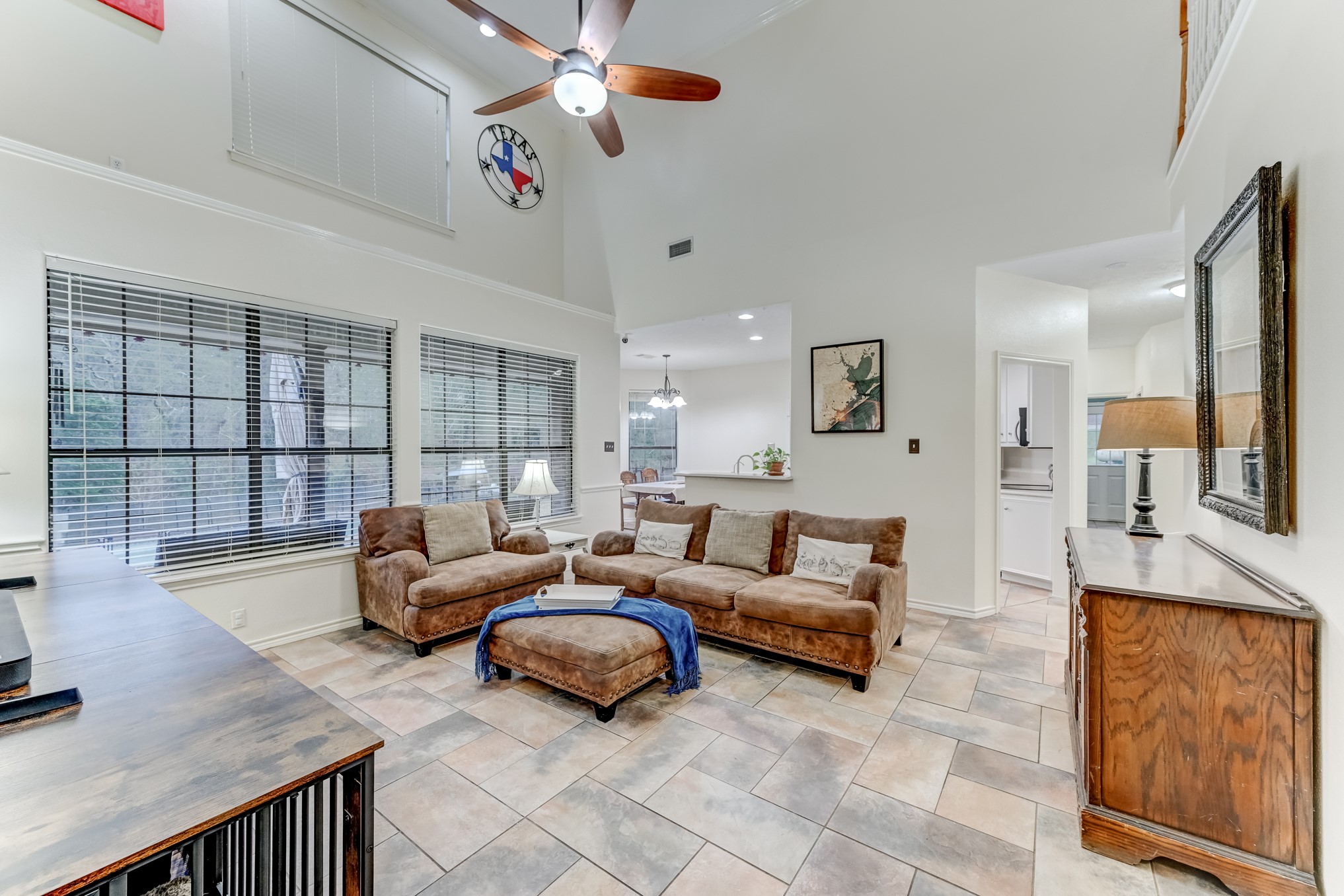 1210 Cherry Creek Road Dayton, TX 77535 - Photo 8 of 50 a living room with furniture and a flat screen tv