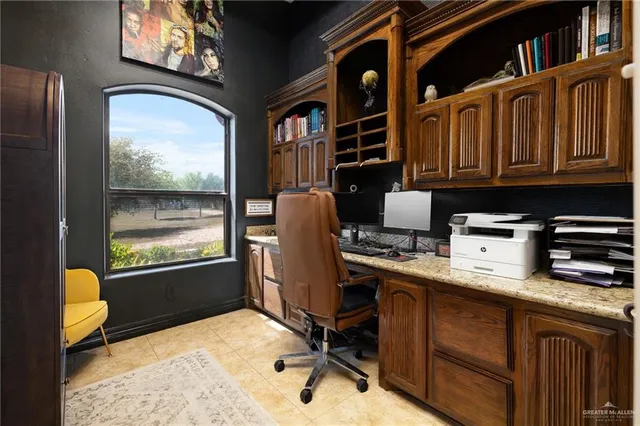 a workspace with cabinets