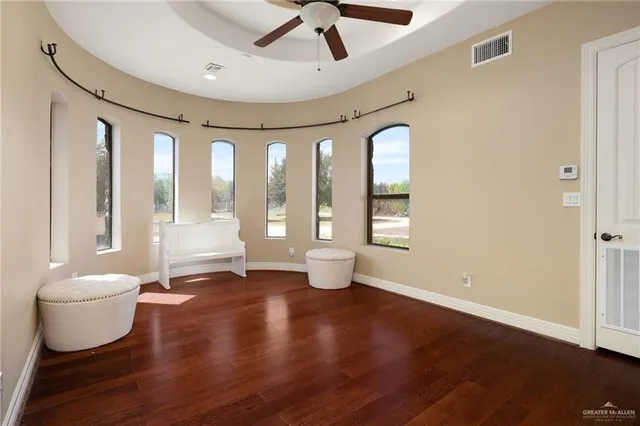 a view of an empty room and window