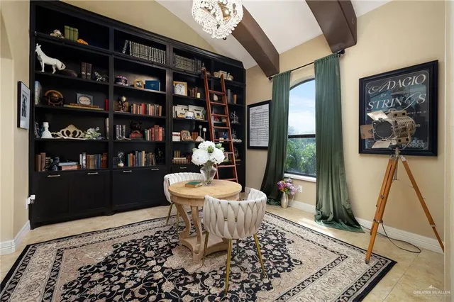 a living room with a couch and a rug