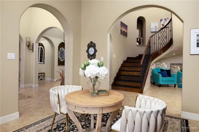 a view of hall way with furniture and entryway