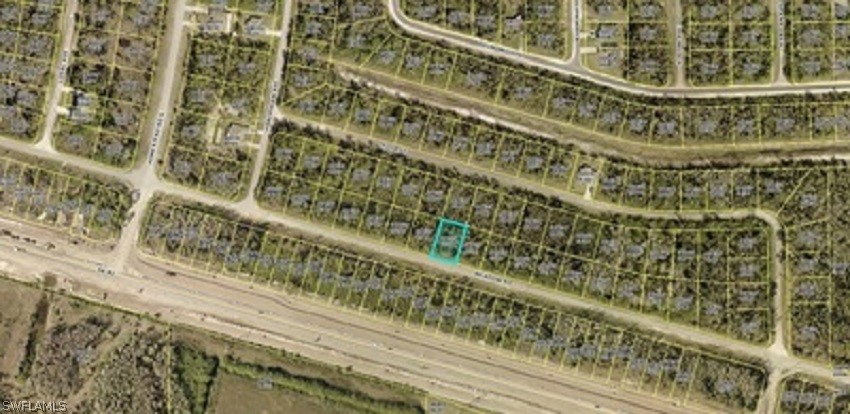 2735 Meadow Road Lehigh Acres, FL 33974 - Photo 1 of 1 view of a large swimming pool