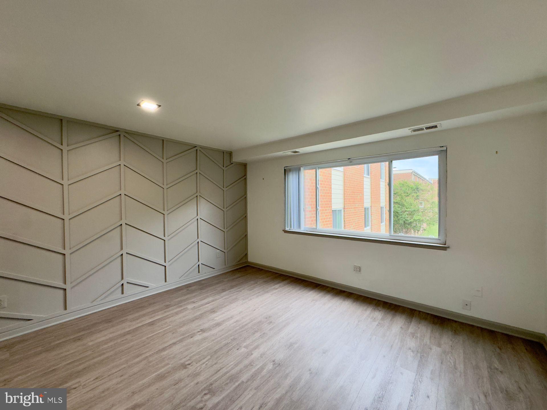 3500 Beech Avenue, Unit 3514A Baltimore, MD 21211 - Photo 3 of 8 a view of an empty room with a window