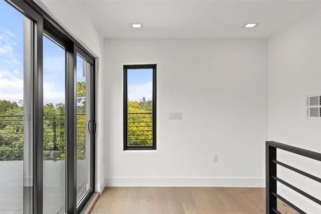 a balcony with view of city skyline