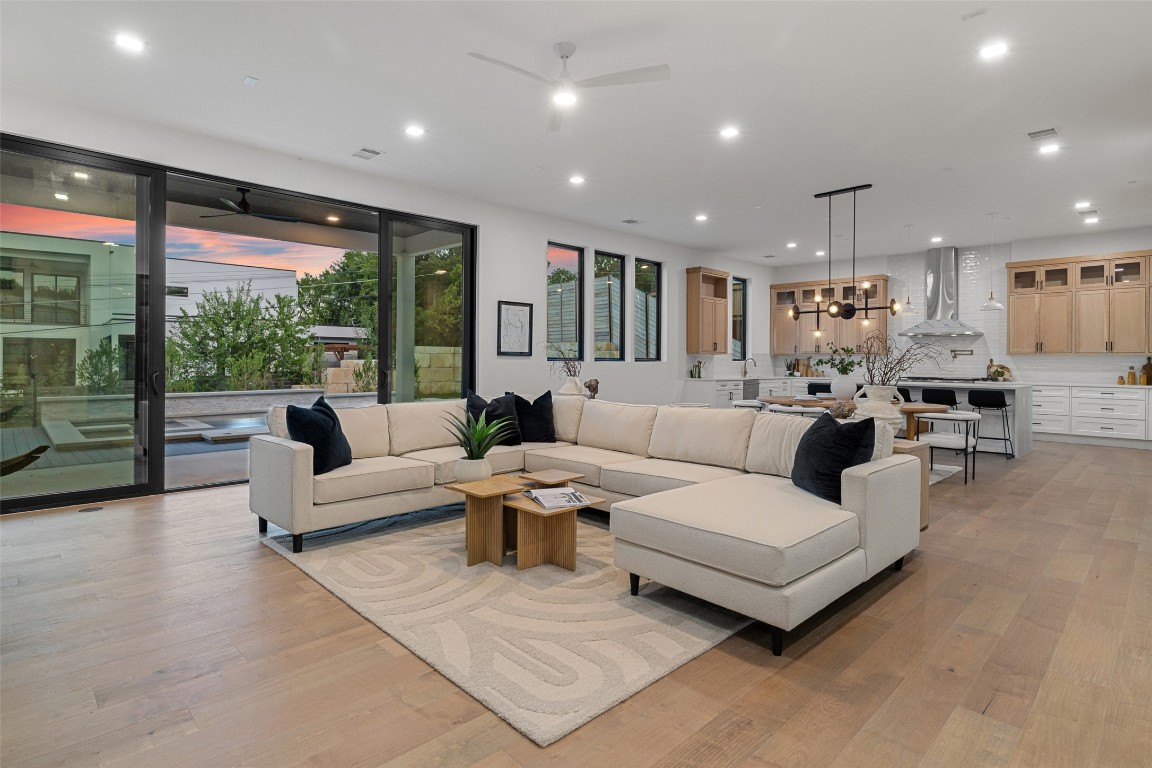 2603 Rockingham Drive Austin, TX 78704 - Photo 6 of 40 Living area with recessed lighting, healthy amount of natural light, light wood-style flooring, and a ceiling fan