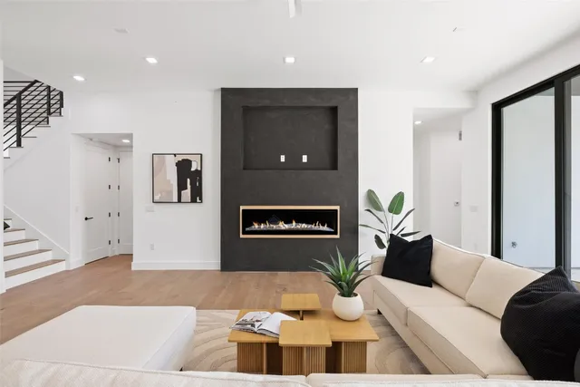 a living room with furniture and window