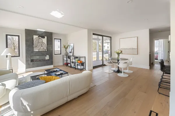 a living room with furniture and a table