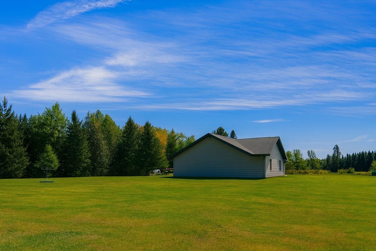 3994 County Rd U South Range, WI 54874 - Photo 43 of 56 View of side of home with a lawn