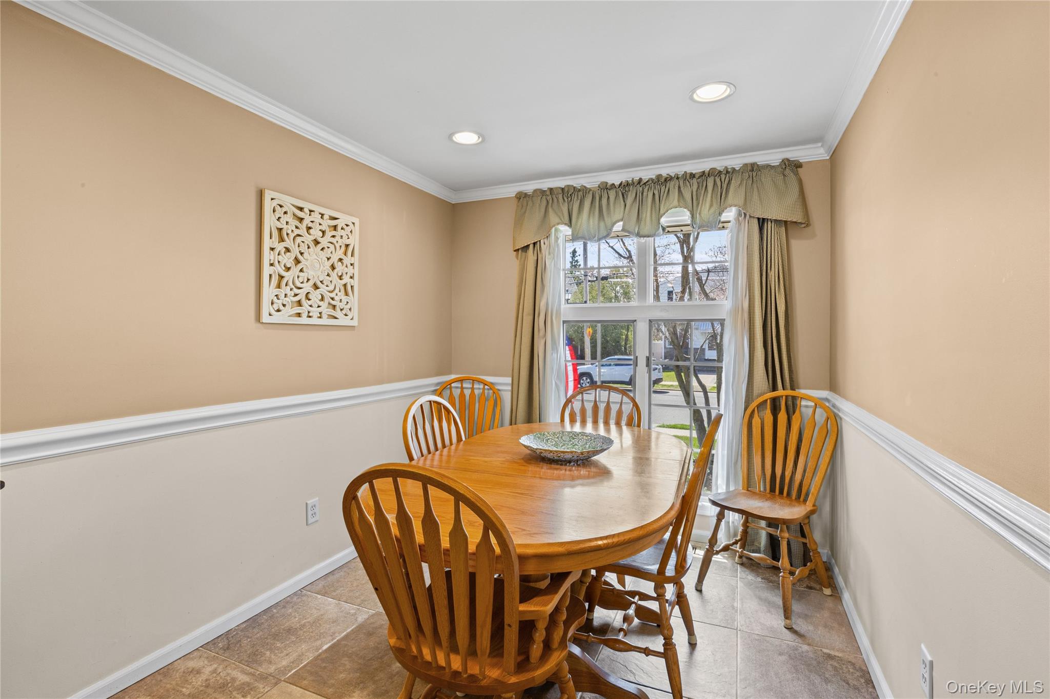 416 Argyle Road Mineola, NY 11501 - Photo 26 of 46 a view of a dining room with furniture and window