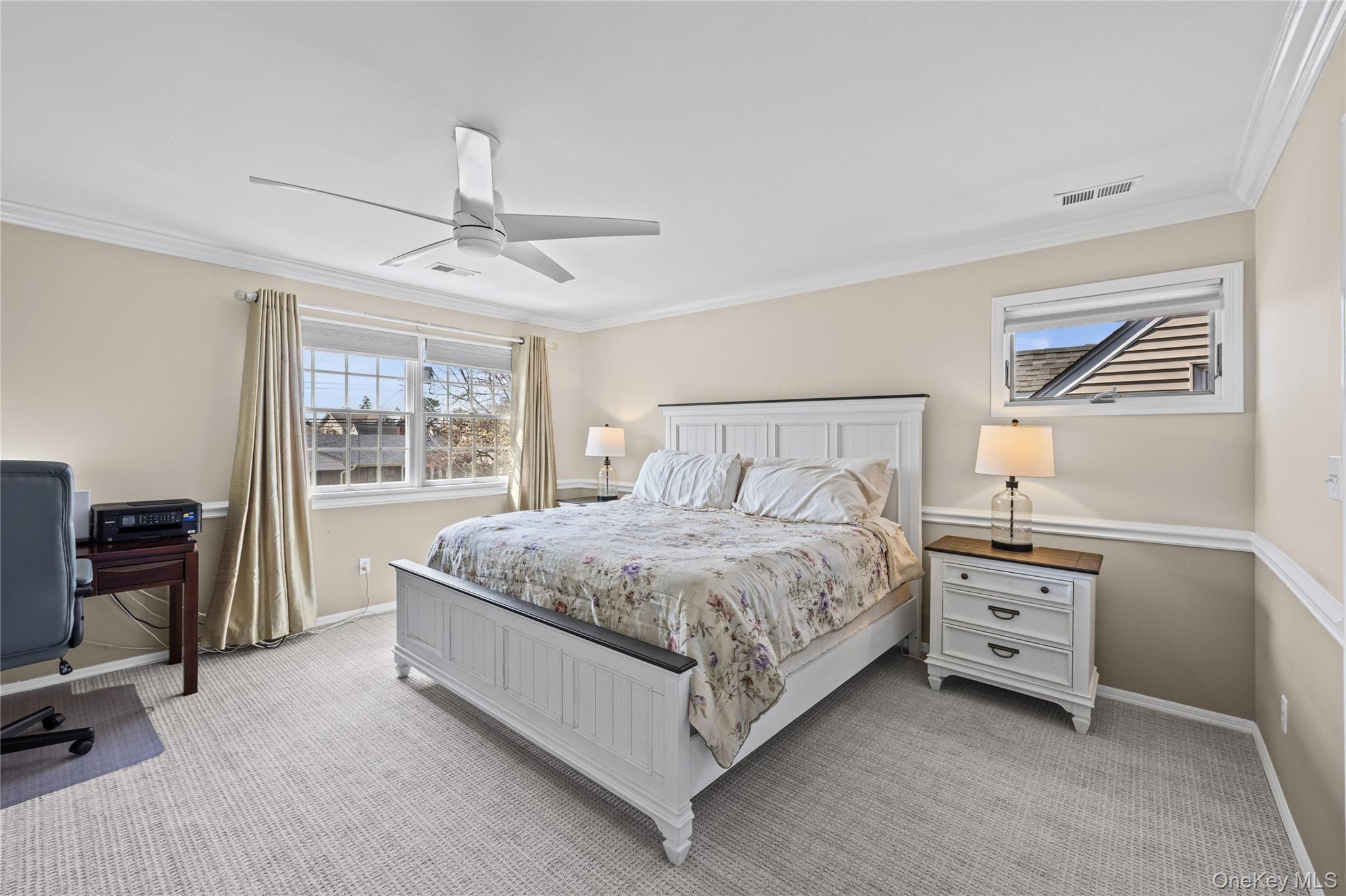 416 Argyle Road Mineola, NY 11501 - Photo 27 of 46 a bedroom with a bed a table and chair