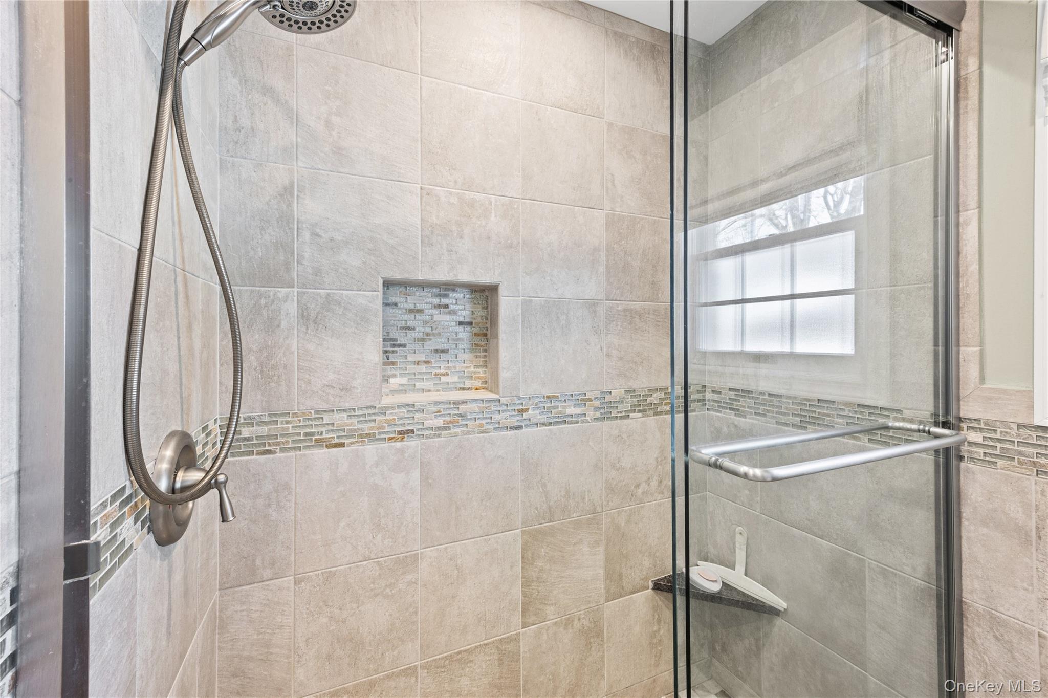 416 Argyle Road Mineola, NY 11501 - Photo 38 of 46 a bathroom with a granite countertop shower and a sink