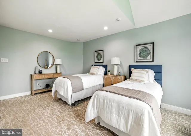 a bedroom with bed and window