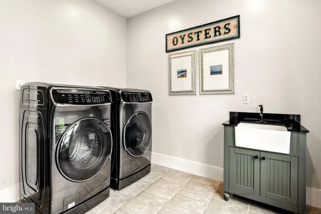 a hallway with sliding door and wooden floor