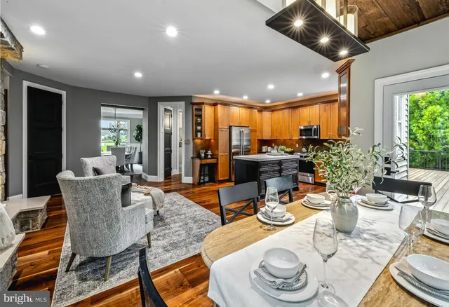 a view of a dining room with furniture window and outside view