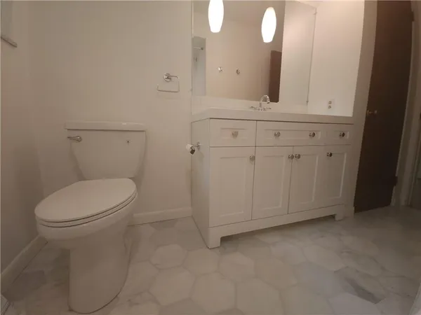 a bathroom with a bathtub and window