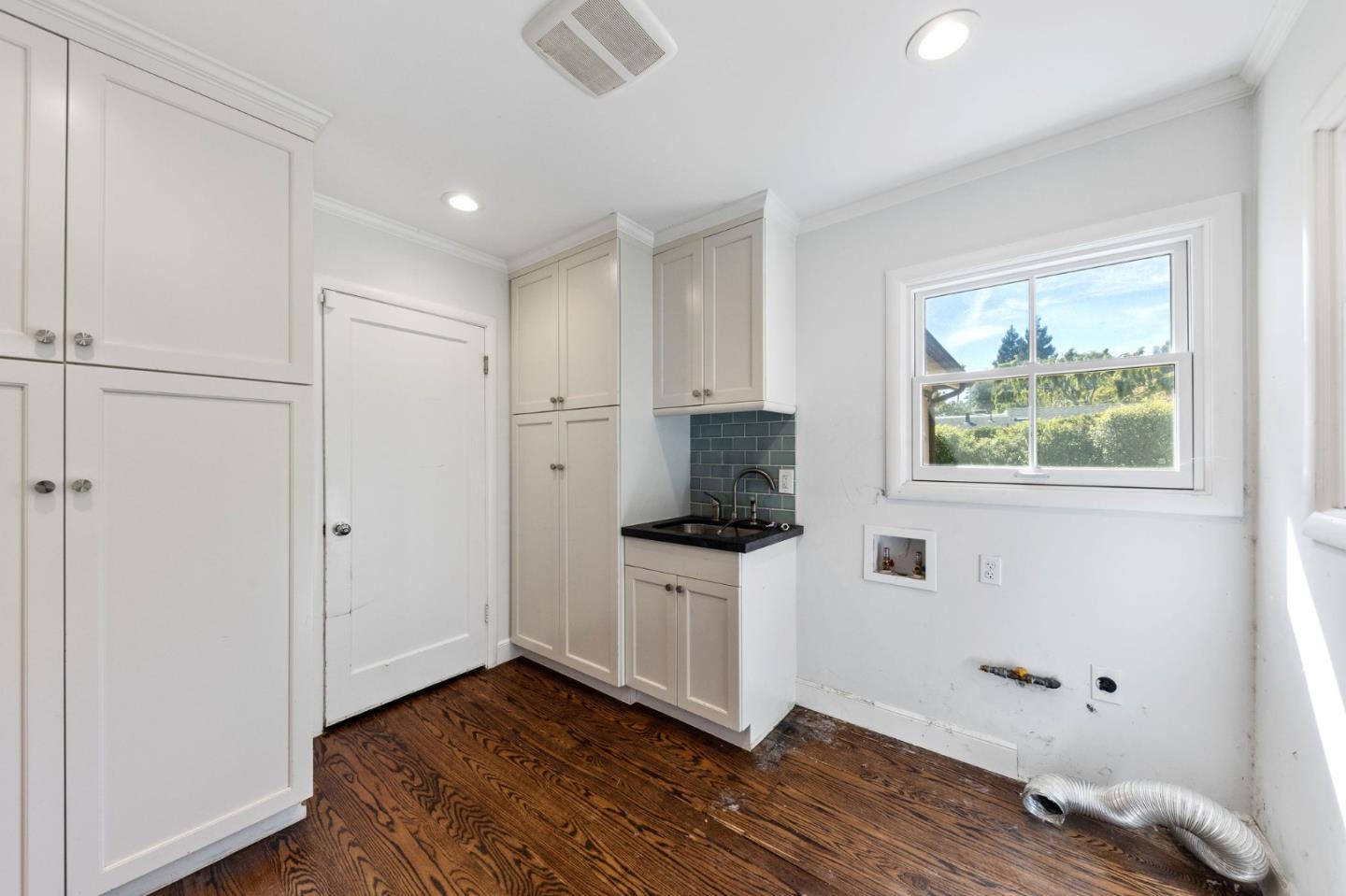 680 Fairway Circle Hillsborough, CA 94010 - Photo 12 of 83 a view of kitchen with wooden floor and electronic appliances