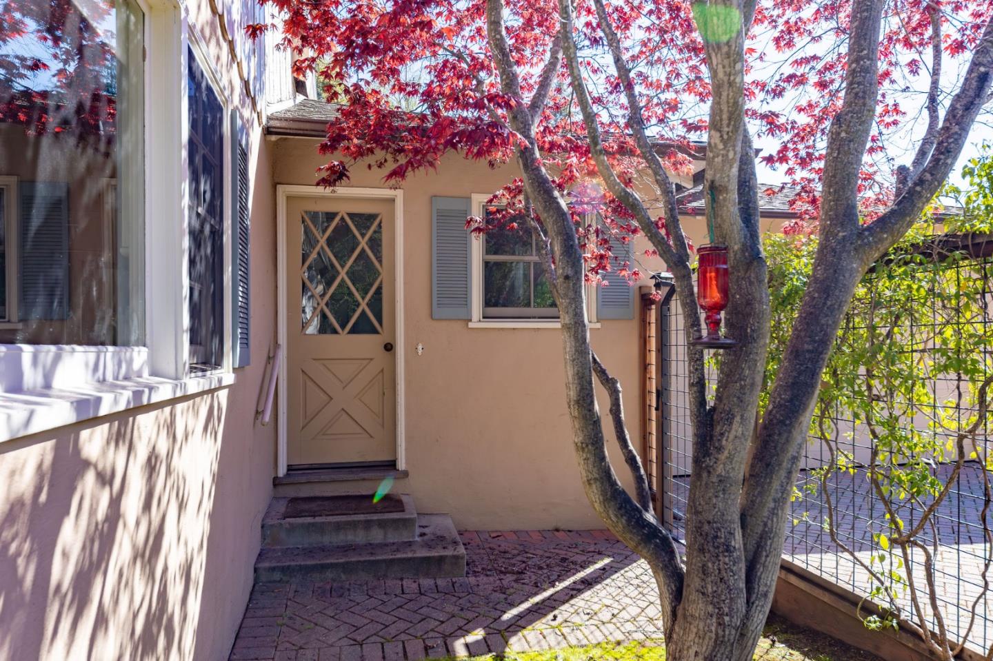 680 Fairway Circle Hillsborough, CA 94010 - Photo 14 of 83 a front view of a house with a yard