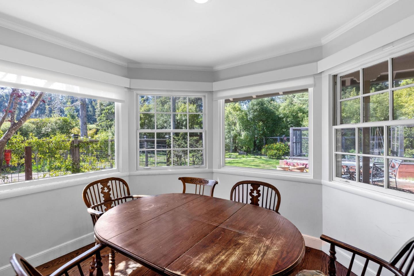 680 Fairway Circle Hillsborough, CA 94010 - Photo 20 of 83 a view of a dining room with furniture window and outside view
