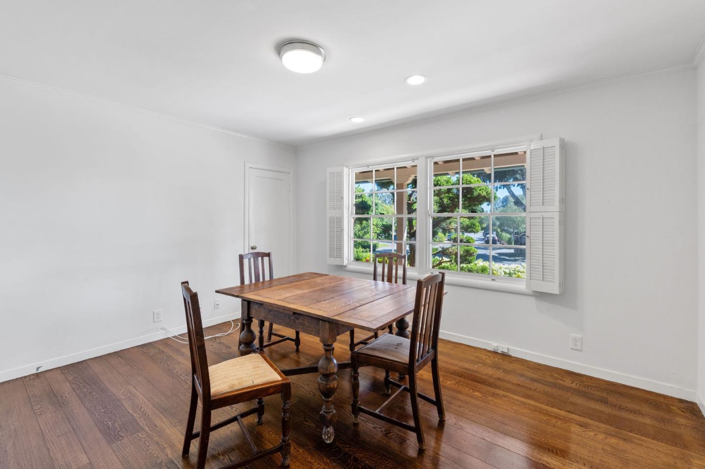680 Fairway Circle Hillsborough, CA 94010 - Photo 29 of 83 a view of a dining room with furniture and wooden floor