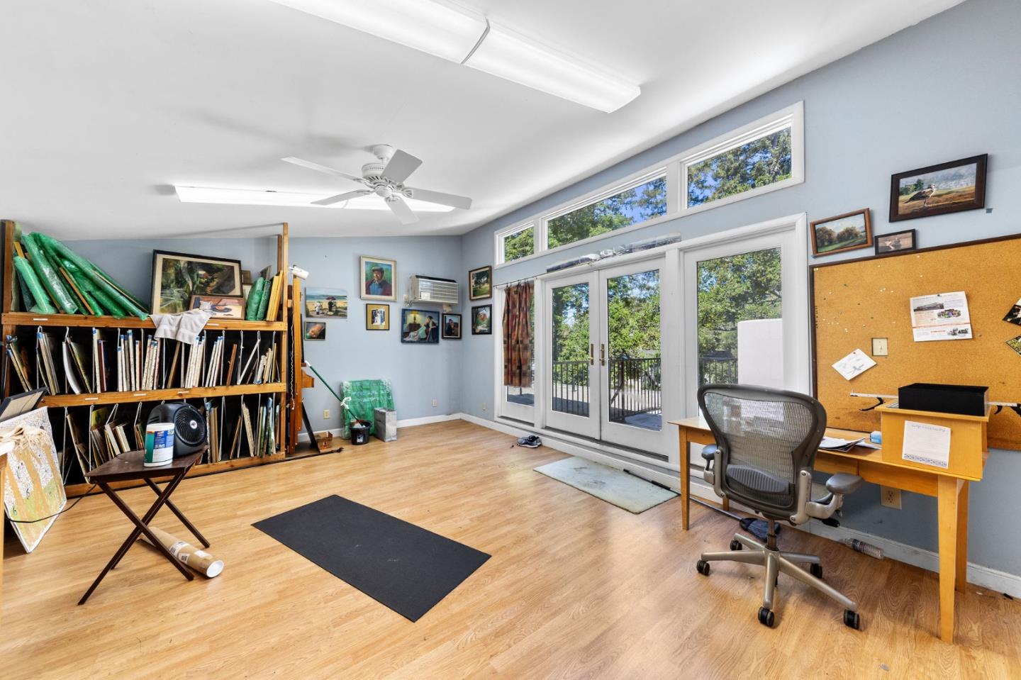680 Fairway Circle Hillsborough, CA 94010 - Photo 43 of 83 a view of a livingroom with workspace and a window