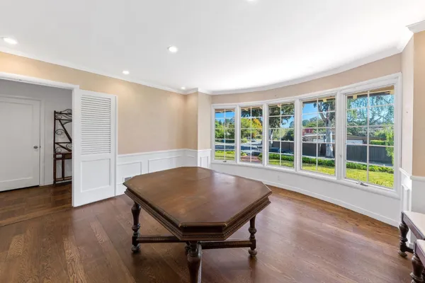 a kitchen with stainless steel appliances granite countertop a stove a refrigerator and a granite counter tops