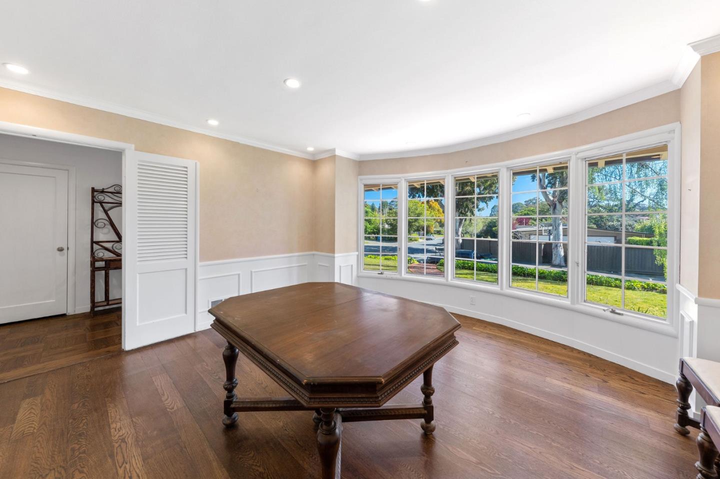 680 Fairway Circle Hillsborough, CA 94010 - Photo 7 of 83 a living room with furniture and a large window