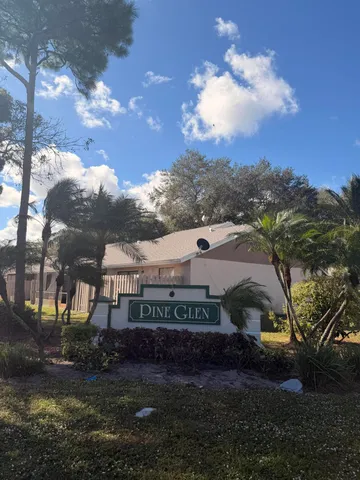 a view of a big yard next to a house